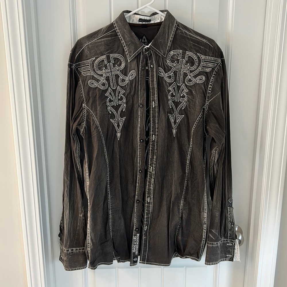 Roar designer long-sleeve shirt with embroidery on front and back.